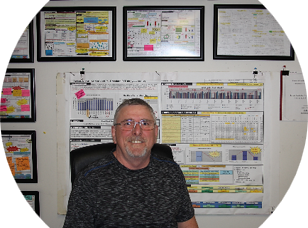Lean TPS Continuous Improvement Facilitator David Devoe at Toyota training board